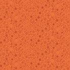 Pattern of pumpkins and flowers on an orange background