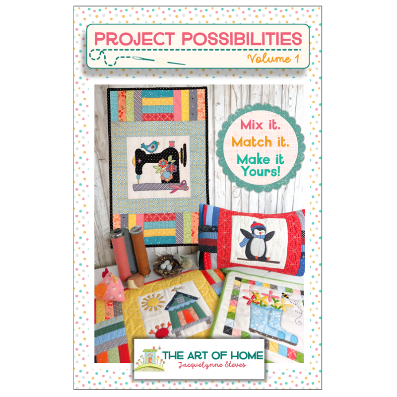 Project Possibilities Volume 1 quilting pattern cover by The Art of the Home, featuring a colorful quilted wall hanging, penguin pillow, and other quilted projects on a white background with a pink polka dot border.
