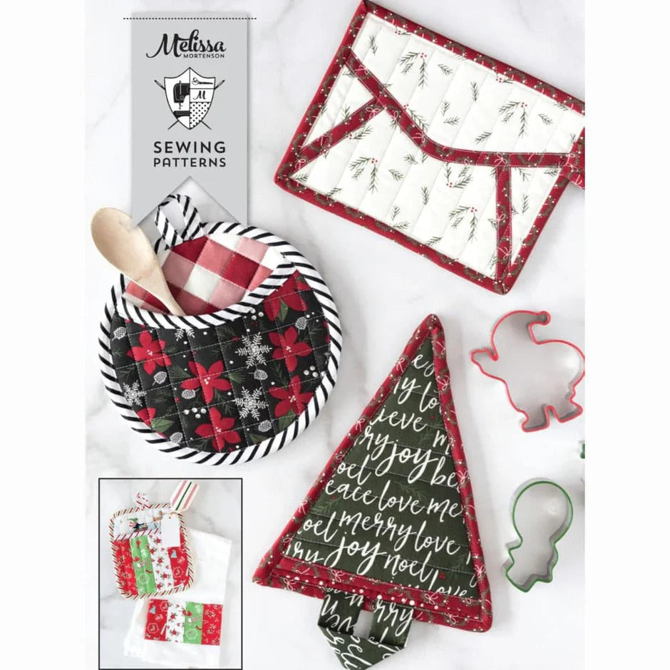 Sewing patterns and fabric pieces with Christmas designs of potholders on a white background