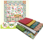 Colorful quilt pattern with fabric swatches on a white background